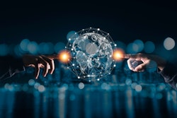 abstract of two people touching the worldwide web.
