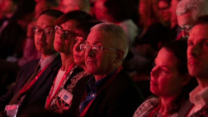 Audience watching a presentation