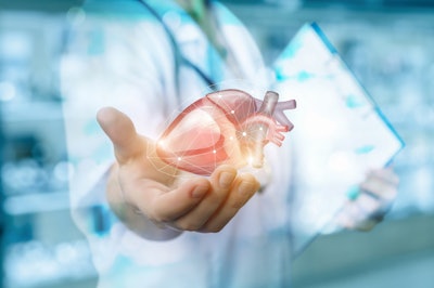 Graphic of doctor holding an illustrated heart in outstretched hand