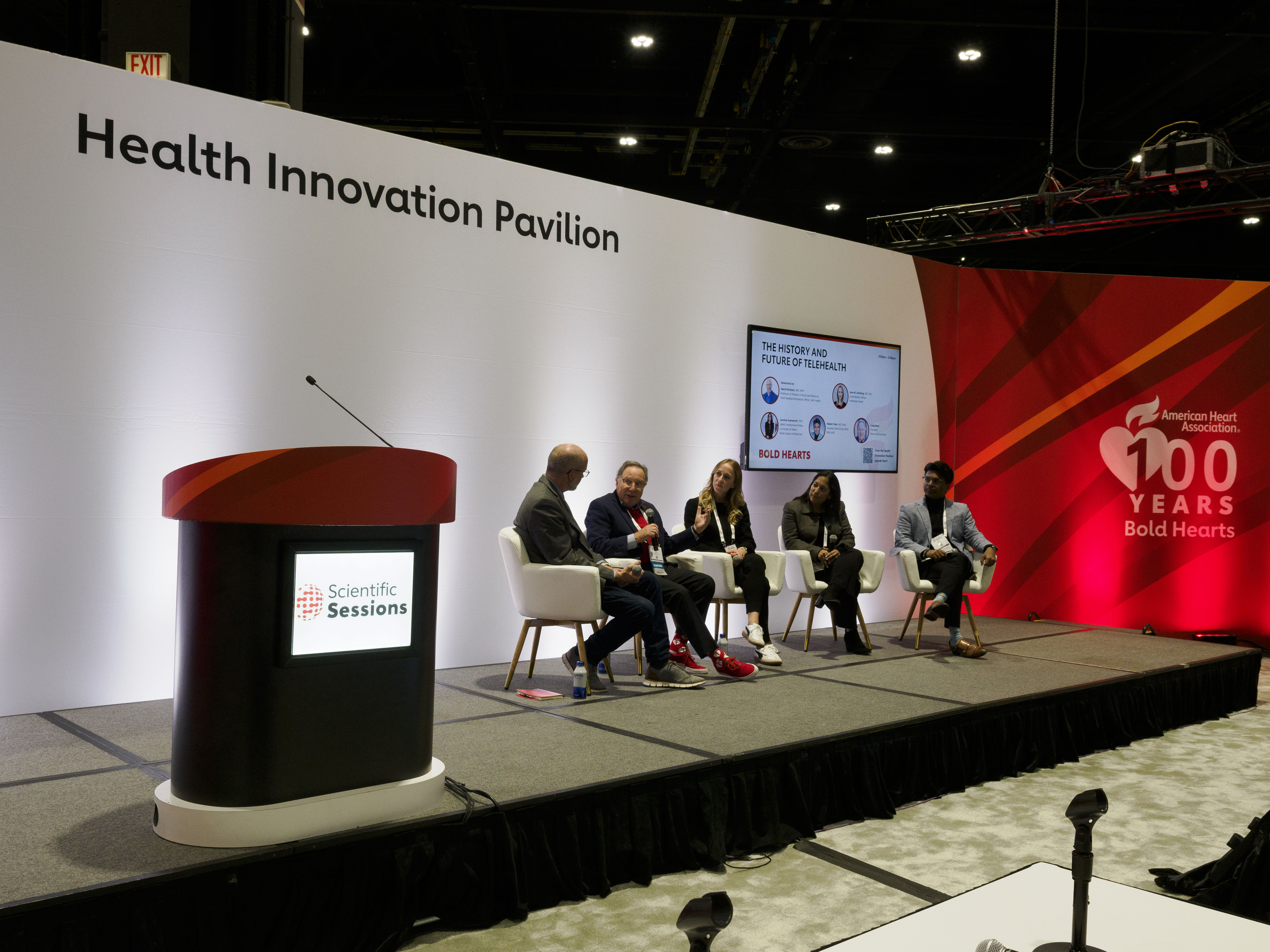 Health Innovation Pavilion panel discussion with speakers at medical conference